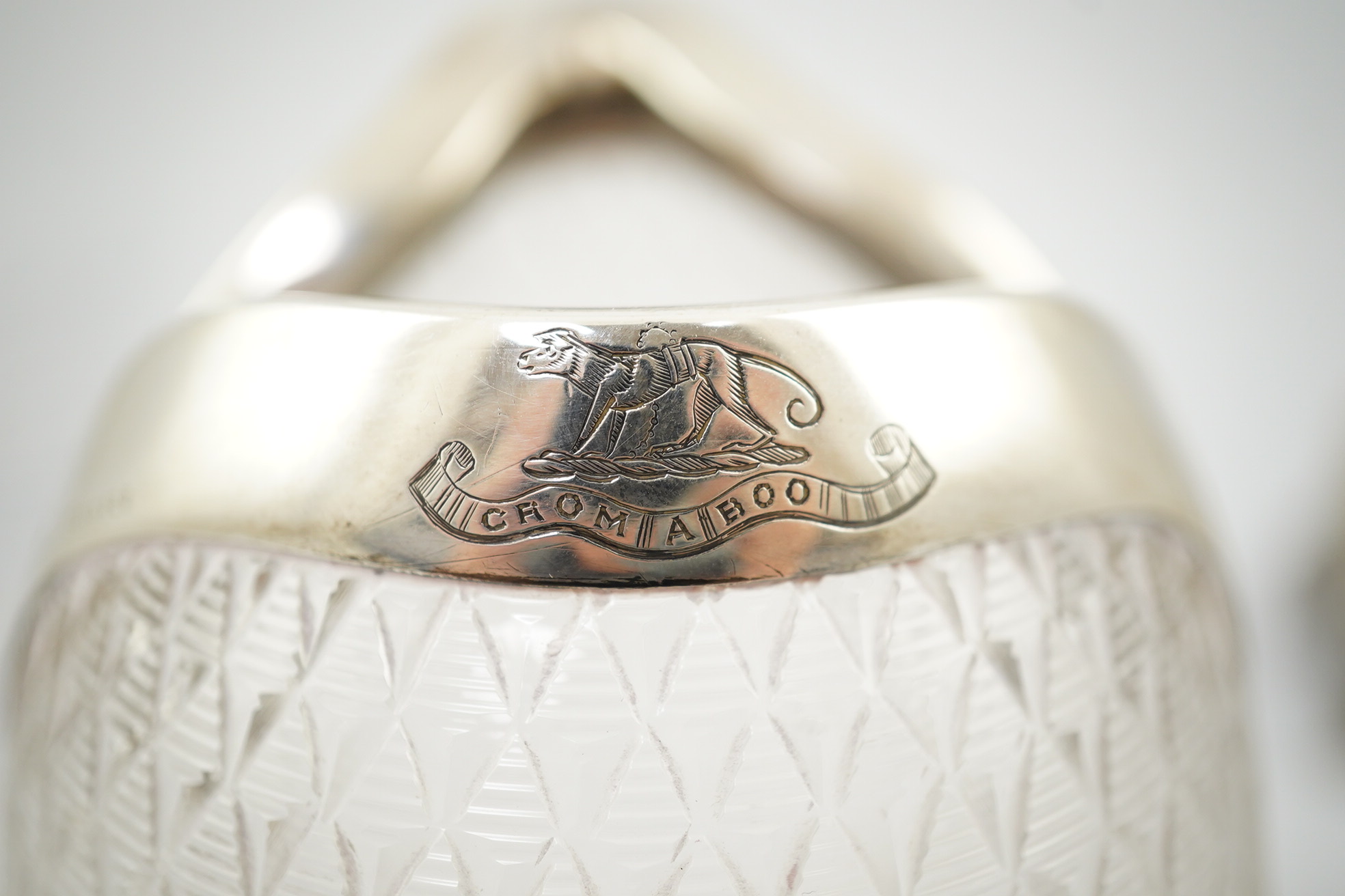 An unusual late Victorian novelty silver mounted single handled cut glass jug, modelled as a fish, by Hukin & Heath